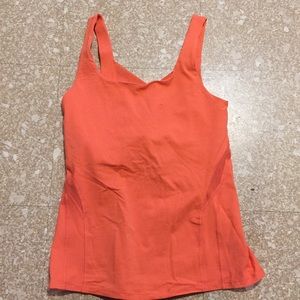 Coral lululemon top with cross back detail